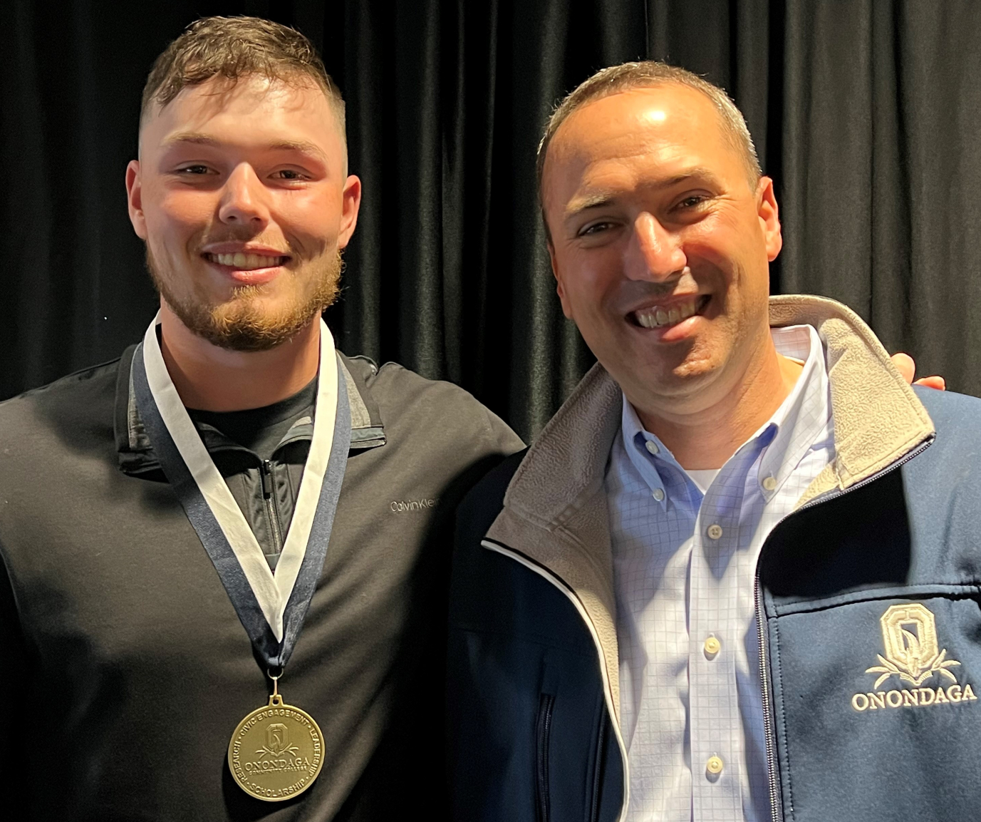Jake Humes (left) and Director of Athletics Mike Borsz (right).