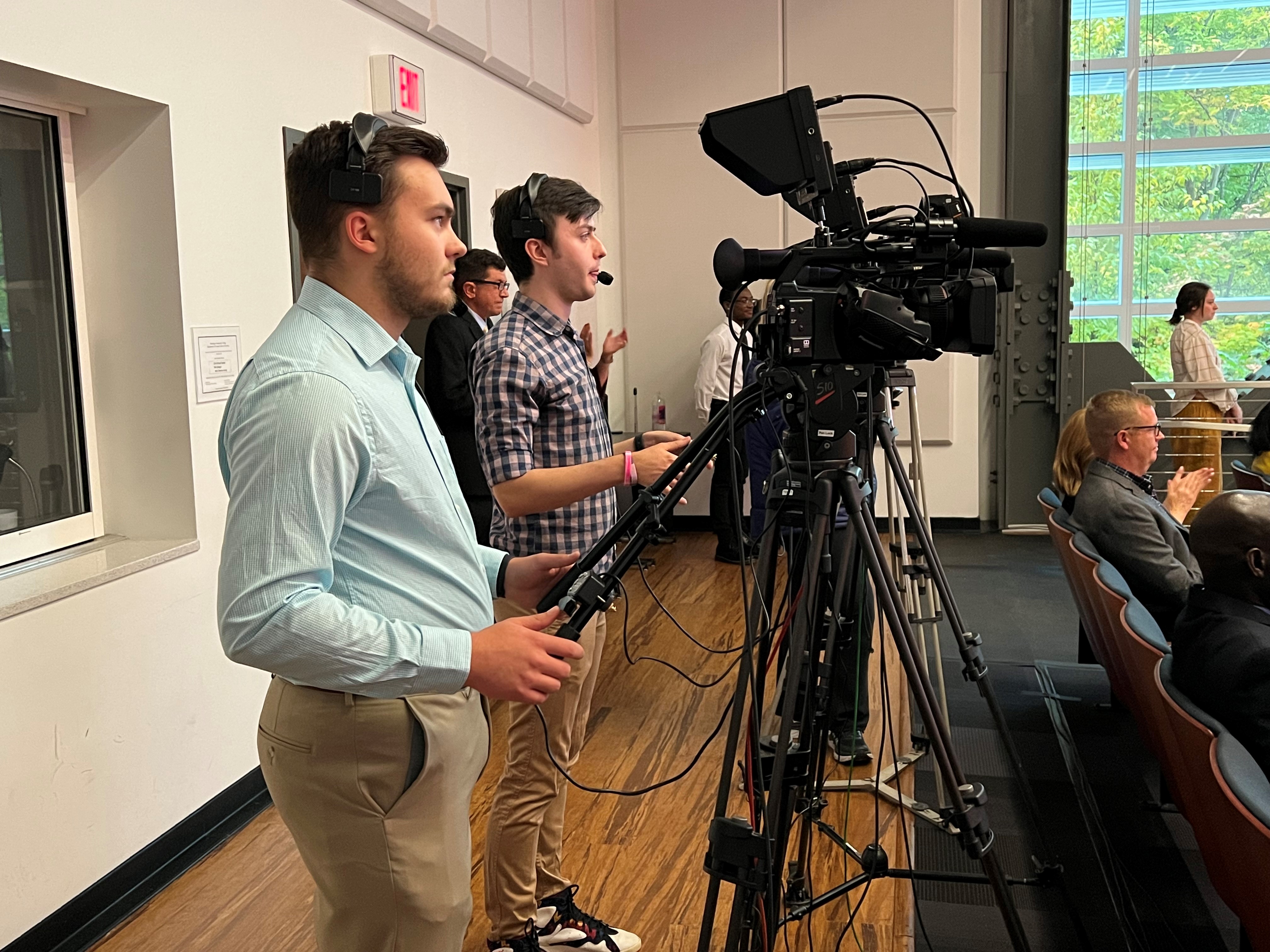 OCC students operating cameras for the livestream were Eric Shear (left) and Kyle Goff (right).