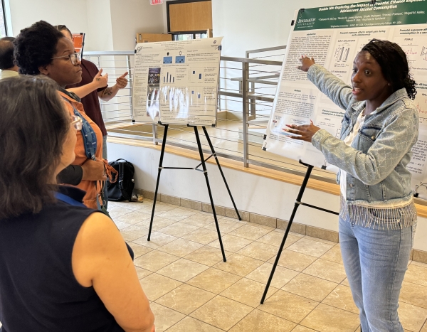 OCC student Dehaven McCray explained the research she conducted at SUNY Binghamton.