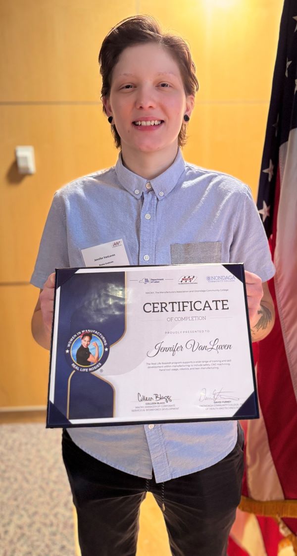 Real Life Rosie Jennifer Van Luven shows off her certificate of completion.