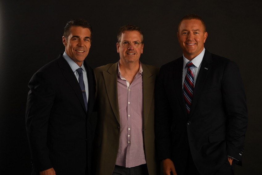 Bonnell (center) with his Saturday Night Football team of Chris Fowler (left) and Kirk Herbstreit (right).