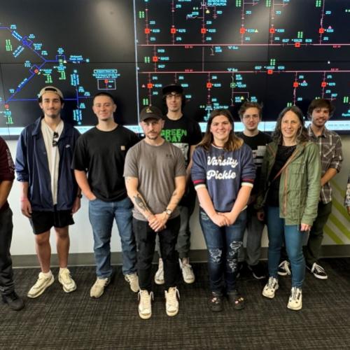 Students in Professor Betsy Nicholas's Power Systems I class visited the National Grid Power Distribution Control Center in Liverpool. They are pictured in the Training Center there.