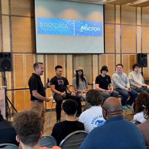 Professor Mike Grieb (standing on left) led a Micron internship panel discussion with students (left to right) RJ Tinsley, Allison Wilcox, Aiden Knapp, Will Appleton, and Sam Pandossi.