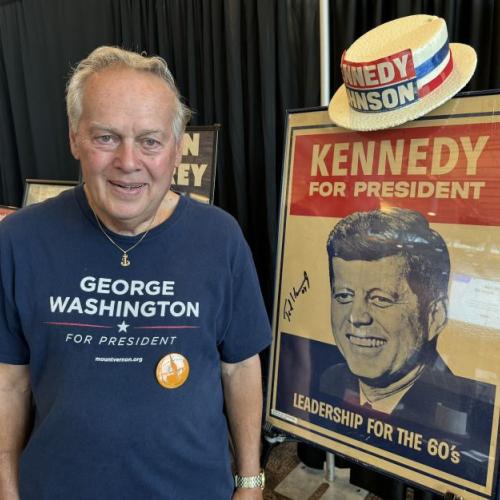 Retired OCC Professor Dick Woodworth brought his political memorabilia collection to campus. He's pictured with the first item he ever collected, a poster promoting John F. Kennedy for President. Woodworth had the poster signed by Kennedy's younger brother, U.S. Senator Ted Kennedy.