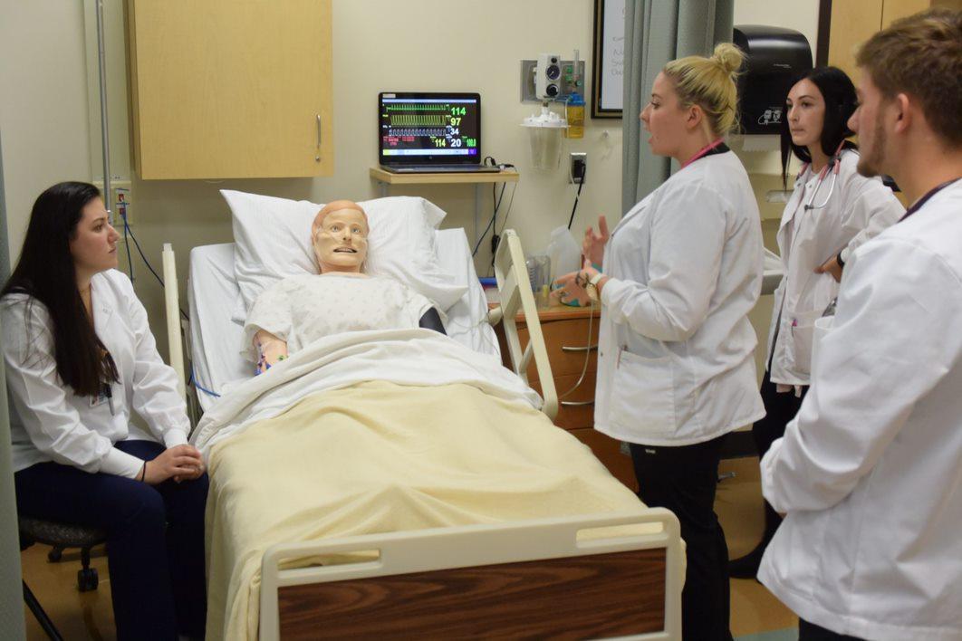 Students work in SIM Lab in Nursing Students work in SIM Lab in Nursing