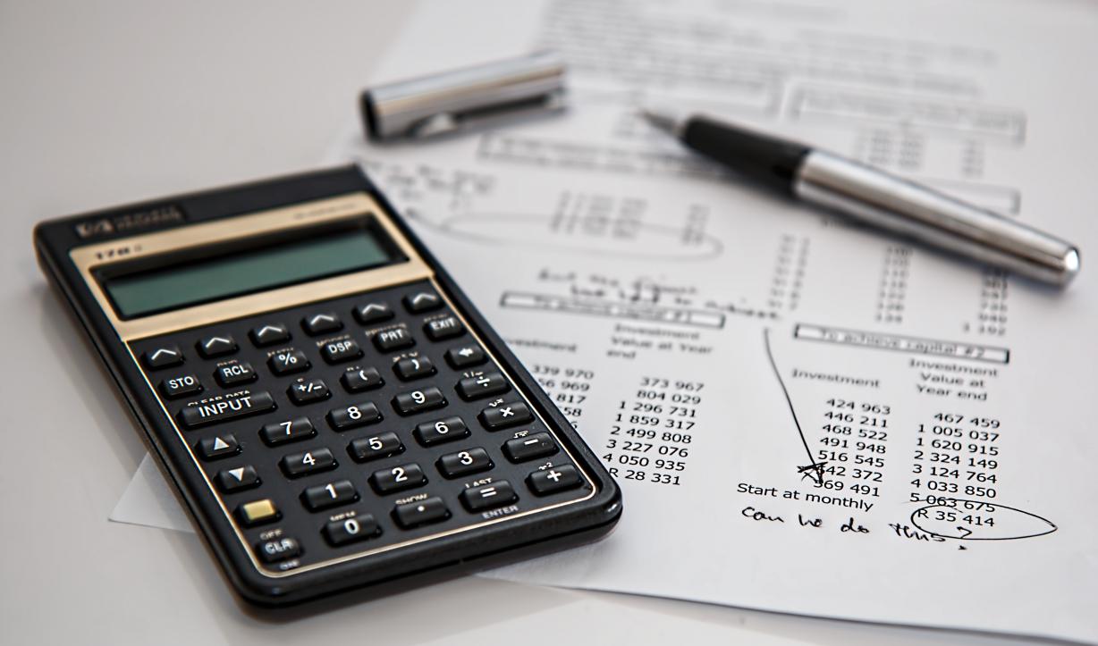 Caculator & Budget Calculator and paper with math
