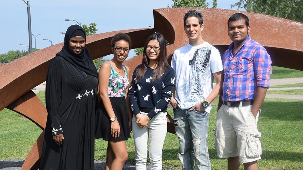 Summer scholarship recipients include (left to right): Deynaba Farah, Ashley Claris, Tam Nguyen, Raul Ceballos and Ghan Timsina. Claris received the Learn As You Grow Summer Scholarship, the others received the National Grid Summer Incentive Scholarship.