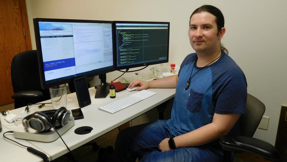 Anthony Olmstead '15 in his office at Kishmish