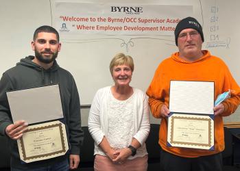 Ronnie Puma (left) and Skip Martin (right) are the first Byrne Dairy employees to complete the Supervisor Academy. They are pictured with OCC's Enid Reiley (center).